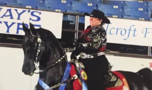 woman on a black horse